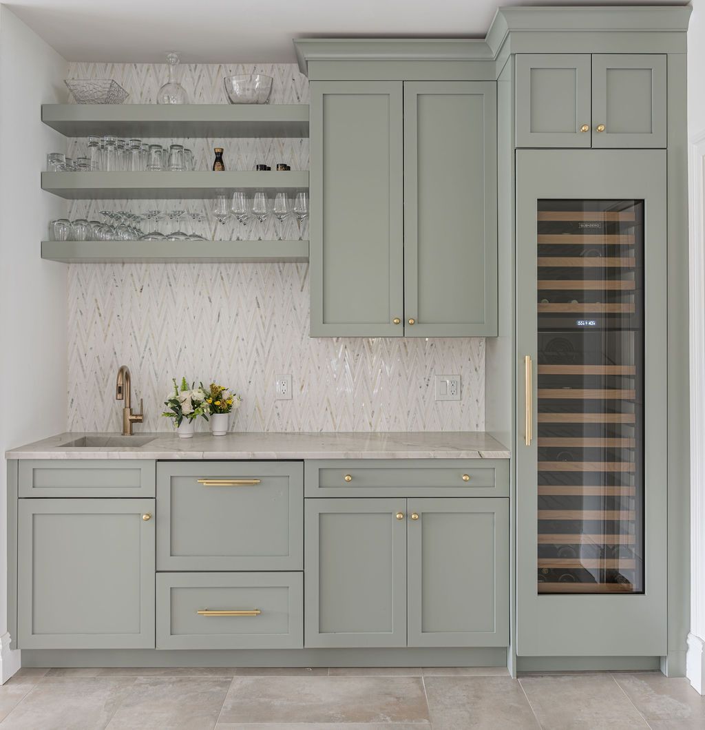 Chatham Boro, NJ wet bar remodel featuring sage cabinetry and herringbone backsplash by G&L and Sons Renovations