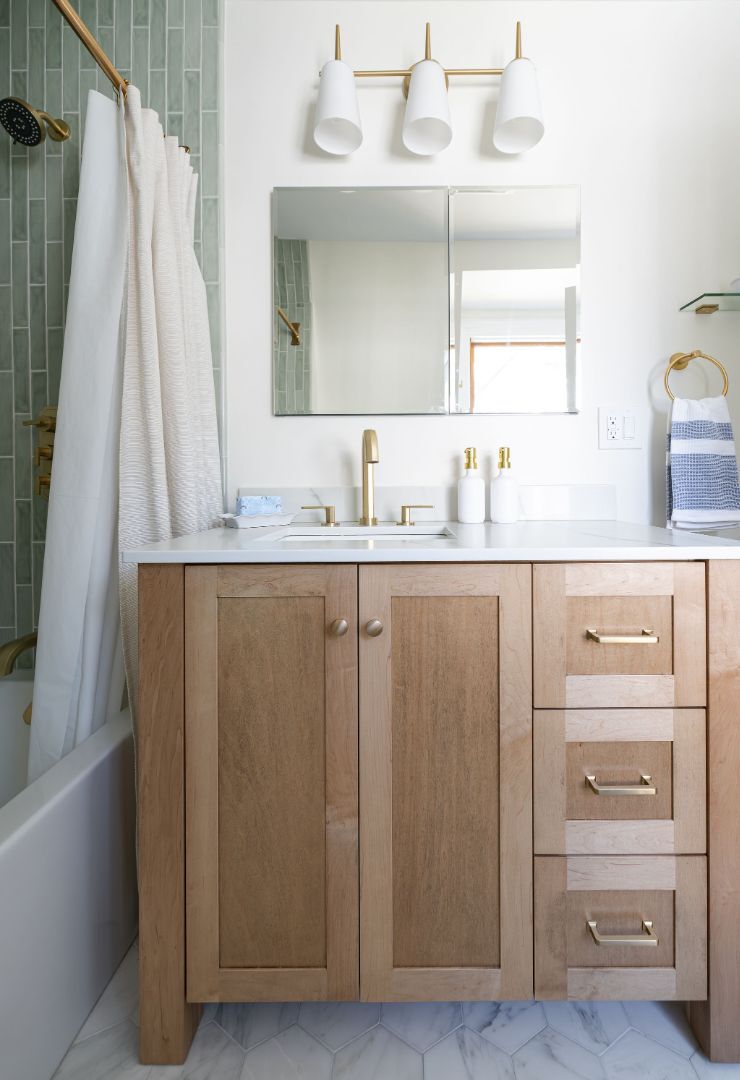 G&L and Sons Renovations custom bathroom update in Madison, NJ with vertical tile and sleek finishes