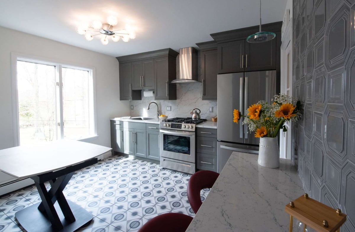 Contemporary kitchen in Wayne, NJ with gray cabinets and marble backsplash by G&L and Sons Renovations