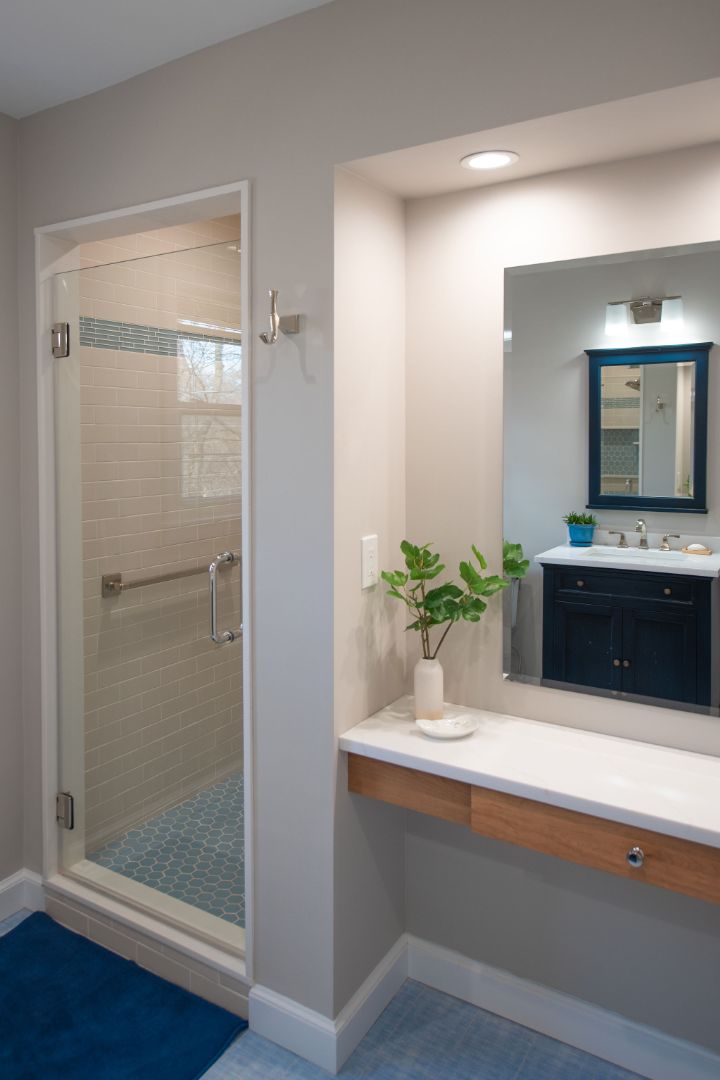 Modern bathroom with glass shower and built-in vanity in a custom home by G&L and Sons Renovations, Caldwell, NJ