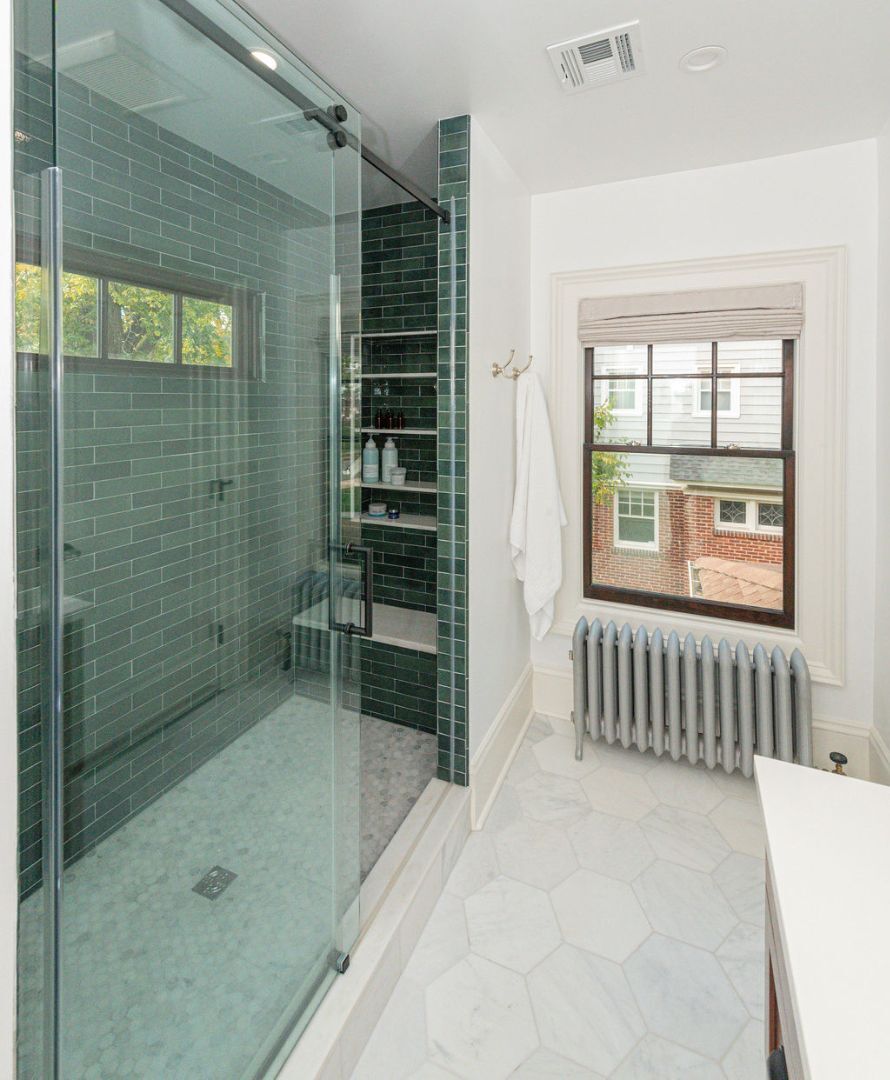 Elegant bathroom with dark green tile shower and hexagon floor tile by G&L and Sons Renovations, Caldwell, NJ