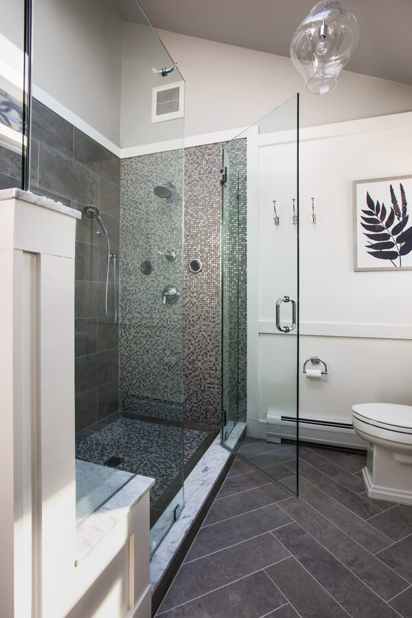 Modern bathroom remodel in New Jersey with walk-in tiled shower